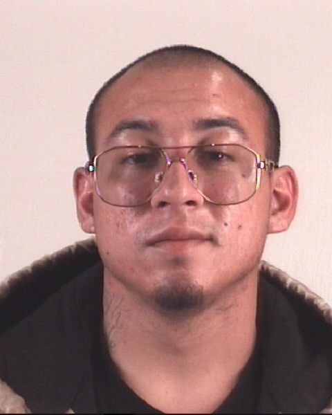 Booking photo of JUSTIN JAVIER AMEZCUA