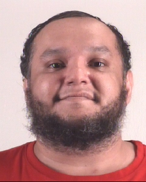 Booking photo of RAUNEL BENITEZ