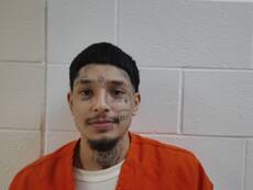 Booking photo of REYNA ISMAEL ANGEL