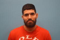Booking photo of Hamza  Rafati