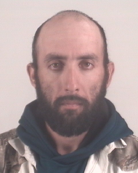 Booking photo of JUAN OMAR HAROS