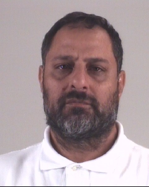 Booking photo of AZHAR SAKHAUDDIN