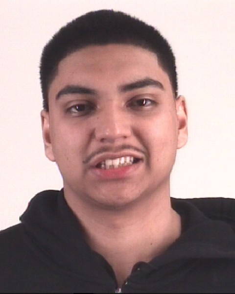 Booking photo of AXEL DEAN PRADO