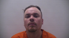 Booking photo of BUSTOS AUSTIN TRAVIS