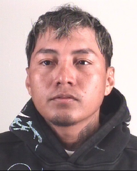 Booking photo of DIXON OROSCOMENDOZA