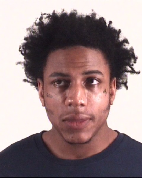 Booking photo of AARON POUCHIE
