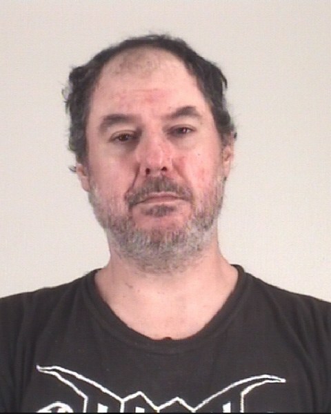 Booking photo of MICHAEL PAPAJOHN