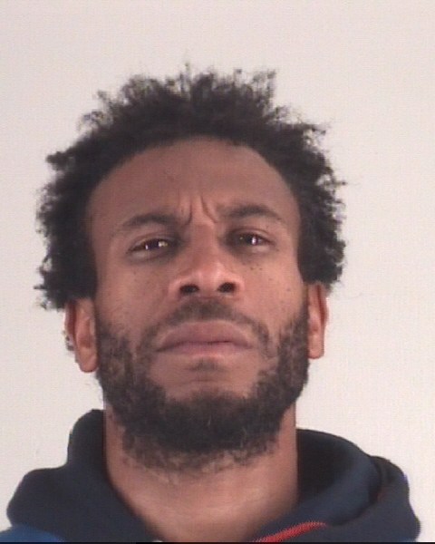 Booking photo of COURTNEY REED