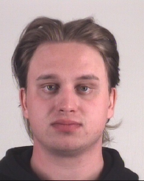 Booking photo of JONATHAN REID