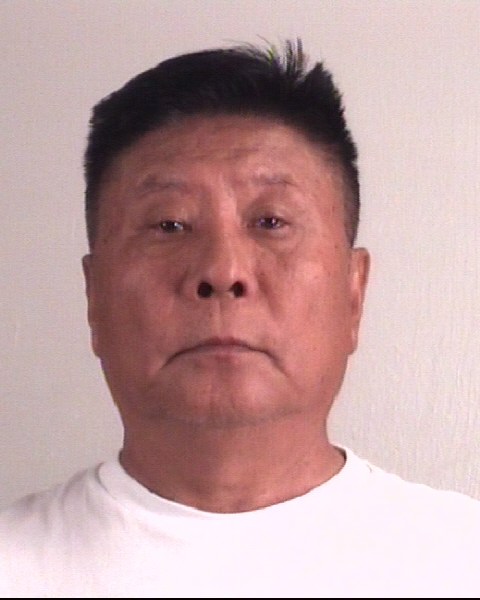 Booking photo of ZHENGUO SUN