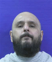 Booking photo of KENNETH SANTODOMINGO