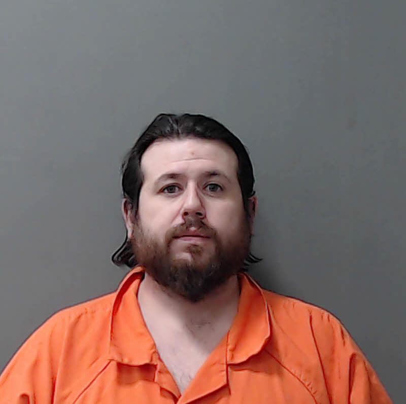 Booking photo of Martinez, Manny J