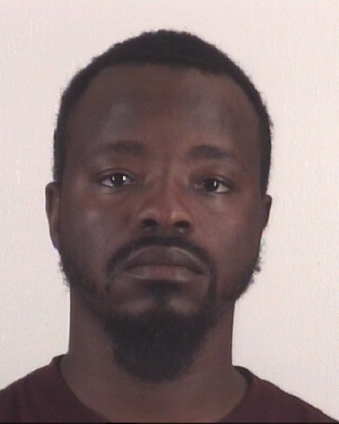Booking photo of MANASSEH DAMBO